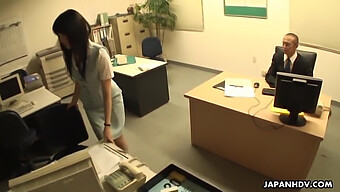 An Asian Girl Experiences Sex On A Workplace Desk