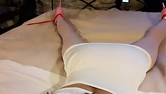 Laura'S Seductive White Dress And Pink Pantyhose Accentuate Her Big Ass, While She Remains Tied And Gagged On A Bed Wearing High Heels