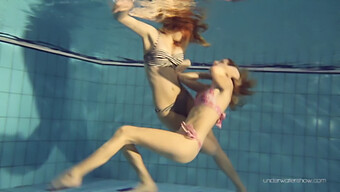 Young And Eager Lesbians Explore Their Desires In A Public Pool